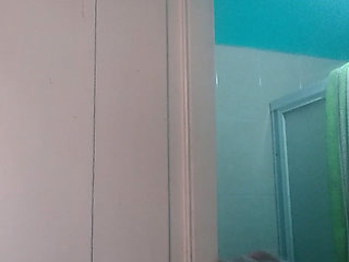 Honbre washes herself in the morning