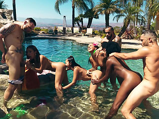 Passionate orgy in the pool