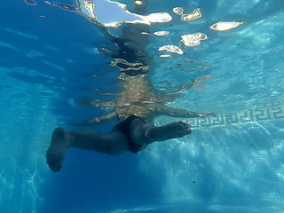 Swimming in the pool naked
