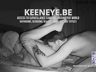 A couple is seen during a private moment on the bed