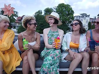 Eve Sweet and Delfine Dahlia Lead Naughty Amateurs in Outdoor Boat Party: Big Tits Bared
