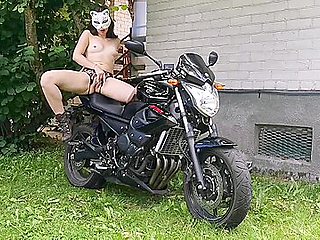 Milf Naked Grinds On The Seat Of The Motorbike With Her Pussy And Makes It Wet From Squirting