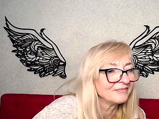 Blonde MILF with glasses on webcam