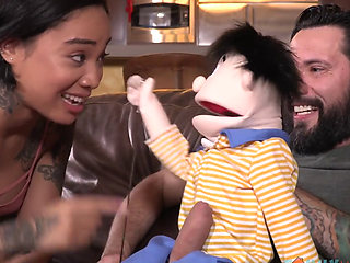 Petite Asian babe rides bearded puppet master stud