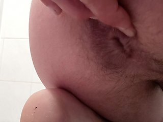 Inserting candy into the anus