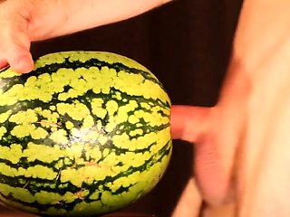 Muscular Stud Fucks and Cums on Watermelon