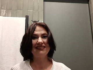 The lady washed in the shower and sat
