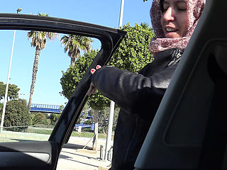 Algerian babe Souzan Halabi flashes her hairy bush to an older man in public