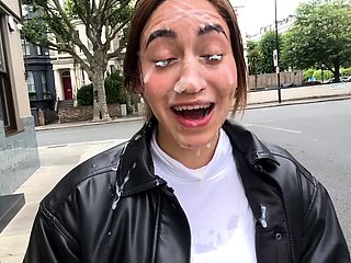 Slut walks around in public with cum all over her face