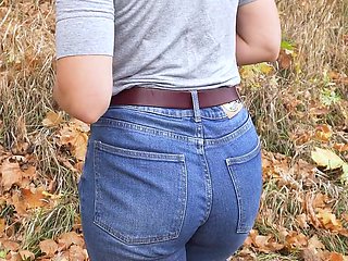 MILF in Blue Jeans Teases Her Amazing Ass Outdoors