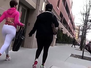 Street voyeur follows a hot ebony babe with a lovely booty