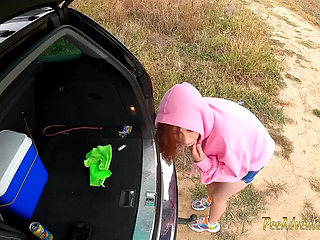 Smoking Redhead with Full Bladder Pisses Outdoors