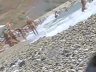 Nudist beach has lots of voyeur&#039;s material over here