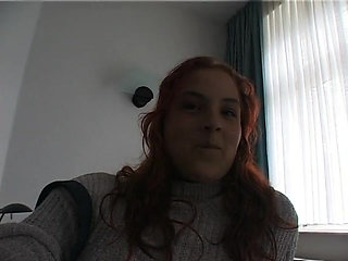 Hairy redhead bbw fingers her pussy on the bed
