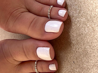 Perfect feet with little foot fetish ring and white nails