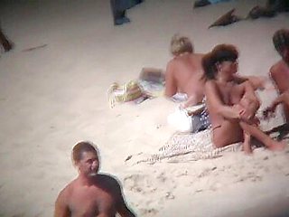Only on a nudist beach can a voyeur find some good chicks