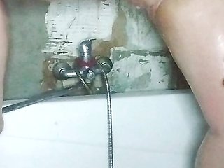 Camera in the bathroom, and a girl with a big ass is peeing, very sexy