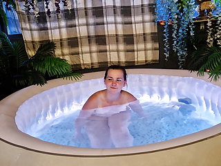 Amateur housewife Playing with herself in the hot tub.