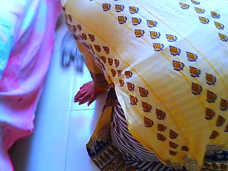 Indian Muslim Bhabhi Gets Stuck Under the Bed While Cleaning the House