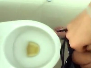 Tattooed Twink Is Pissing in Waterpark Piss Filled Toilet