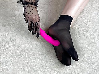 Foot fetish caresses in black nylon socks with my favorite sex toy