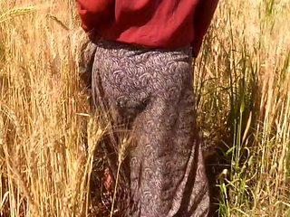 The step-sister-in-law showed her brother-in-law her fat ass in her wheat field with her brother-in-law in the open forest in the field.