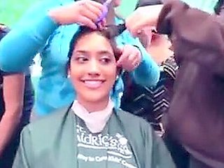 Cute indian girl gets shaved for charity