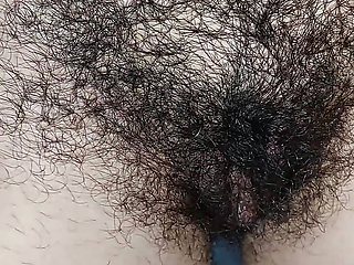 Hot mom fingers her hairy pussy, big breasts, big nipples. Sexy Latina satisfies herself, hairy ass, big breasts, long hair.