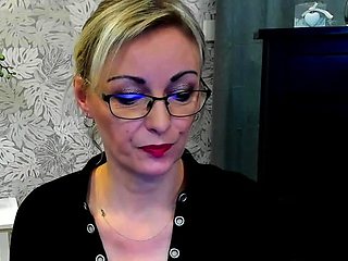 Blonde MILF takes off bra on webcam