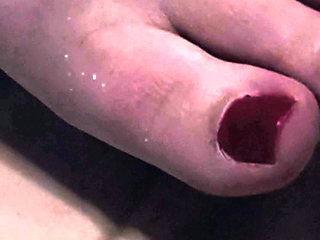 Sexy Red Toes in Bed