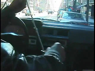 Commuter redhead carpools with creep who debases her in car in city traffic