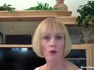Blonde grandma is tugging and sucking cock in POV