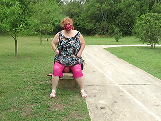 Park bench face sitting in my pink lace