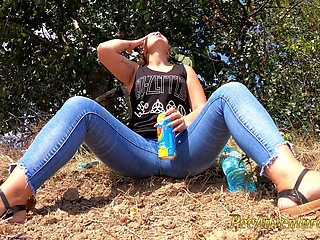 Chubby girl talking on the phone with her boy friend pee in her jeans