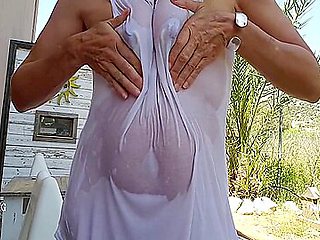 Nippleringlover Horny Milf Nude Outdoors Playing With Hose In Wide Open Pierced Pussy Big Nipples See Through Wet Shirt