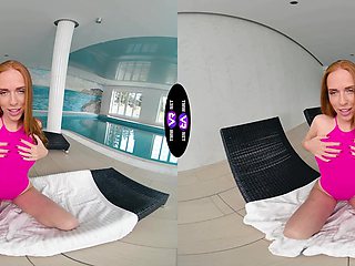 Redhead beauty Holly Molly enjoys solo sex by the pool