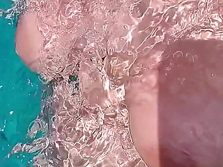 Swimming in the blue waters of Greece butt naked...