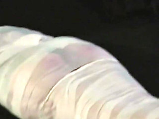 Barefoot Astrid Gets Mummified with White Bandages and Gagged Tightly