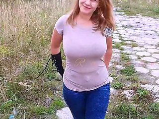 Busty babe playing with her big boobs