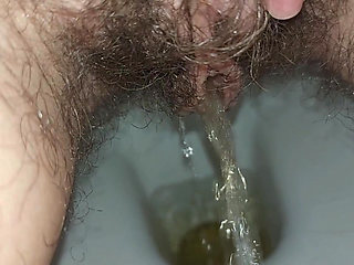 the longest trip to the bathroom, a very long piss, a hairy pussy peeing