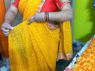 Beautiful Indian bhabhi having wearing a saree.