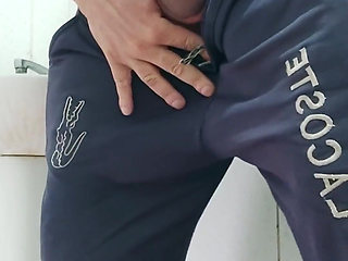 A Well-endowed Brazilian Man Urinating and Showing His Thick Penis to His Female Friends.
