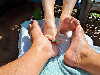 Massage oil on our feet for us while we relax