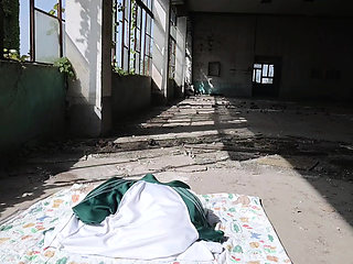 Cute Asian boy masturbates, moaning, ejaculating, and swallowing semen in a sunlit abandoned factory