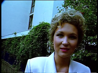 Classy german females giving an outdoor interview