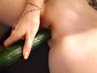 Playful private erotic adventure with a cucumber in front of the camera