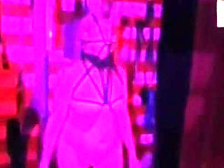 Dom Gresopio in Shibari Corset with Clothing and Mask