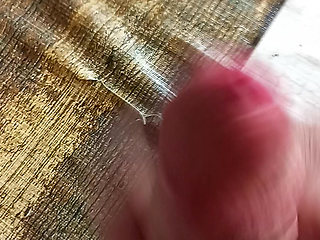 Jerking off my big fat cock until I cum a lot in the foreground