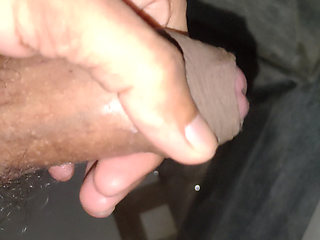 Man masturbating in bathroom