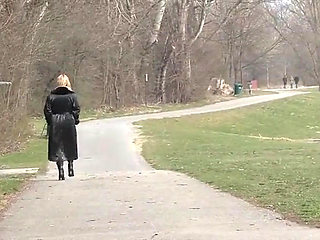 Bitch in leather pissing on a pier